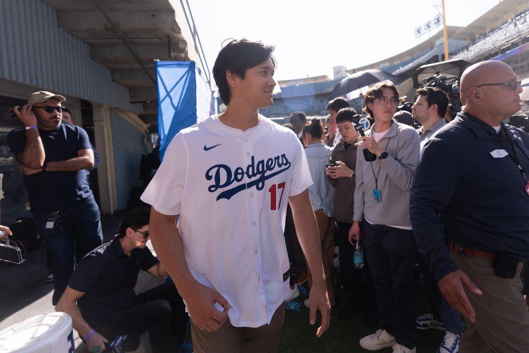 Los Angeles Dodgers two-way player Shohei Ohtani leaves after talking to  reporters during DodgerFest at Dodger Stadium in Los Angeles on Saturday. |  Sandusky Register