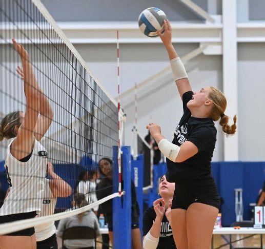 Vermilion\'s Sophie Habermehl tips the ball over the net  during the Summer Spiketacular at Cedar Point Sports Center on Friday, July 17, 2026.