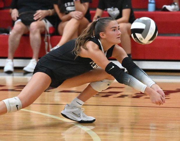 Perkins\' Olivia Badamy dives for the ball during a match against Bellevue at Perkins High School on Monday, Aug. 31, 2026.