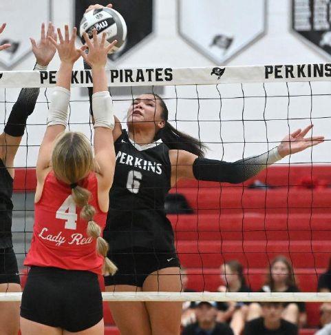 Perkins\' Viera Walker (6) tips the ball past Bellevue\'s Ellie Freitag (4) during a match at Perkins High School on Monday, Aug. 31, 2026.
