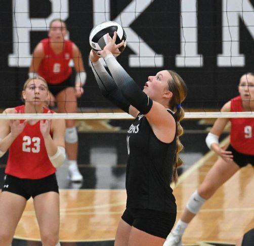 Perkins\' Braelyn Davie sets up a hitter during a match against Bellevue at Perkins High School on Monday, Aug. 31, 2026.