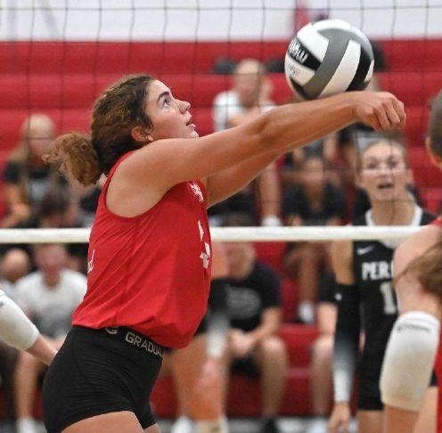 Bellevue\'s Calie Cramer sends the ball over the net during a match at Perkins High School on Monday, Aug. 31, 2026.
