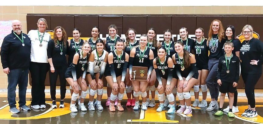 Perkins poses with its district runner-up trophy at Old Fort on Thursday night.