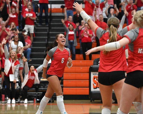 Huron\'s Paige Johnson (6) celebrates match point with her teammates during a Division V district final against Archbold at Seneca East High School in Attica on Thursday, Oct. 29, 2026.