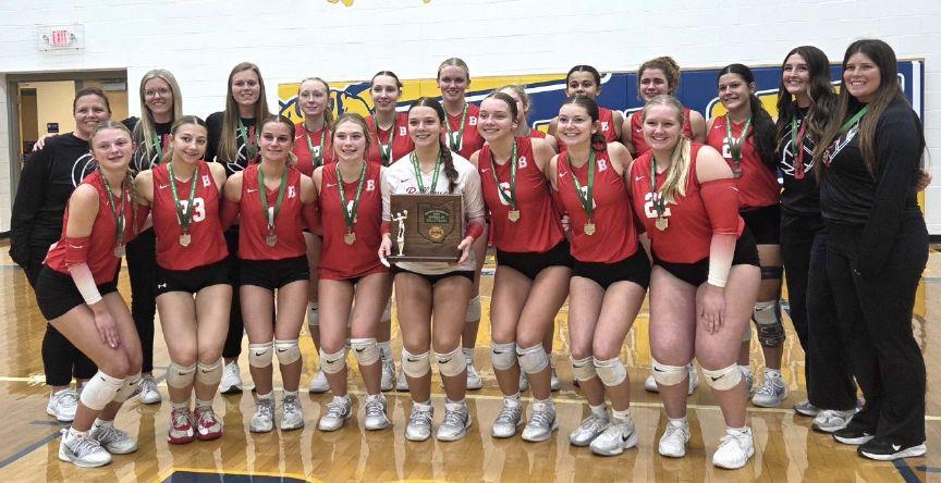 Bellevue poses with its district runner-up trophy Thursday night.